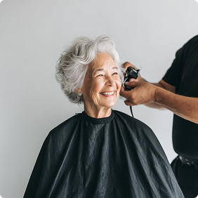 Resident smiling in chair
